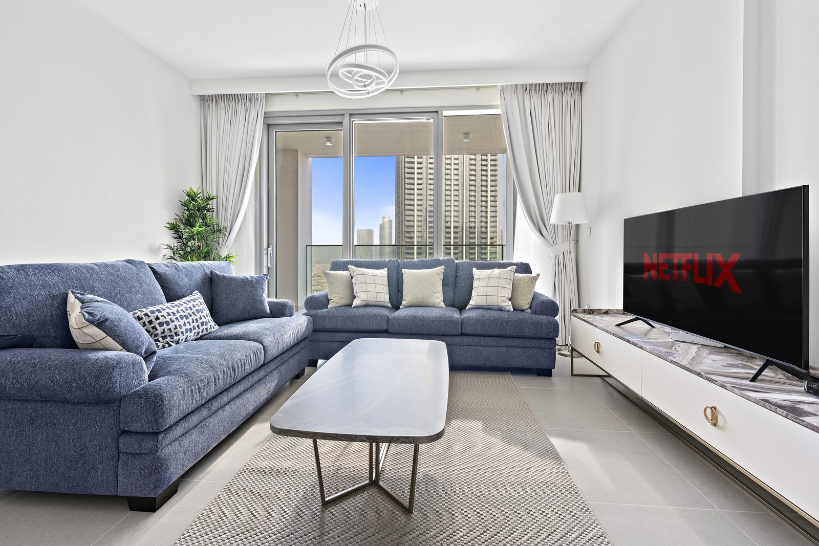 Spacious Dubai apartment living room with city views